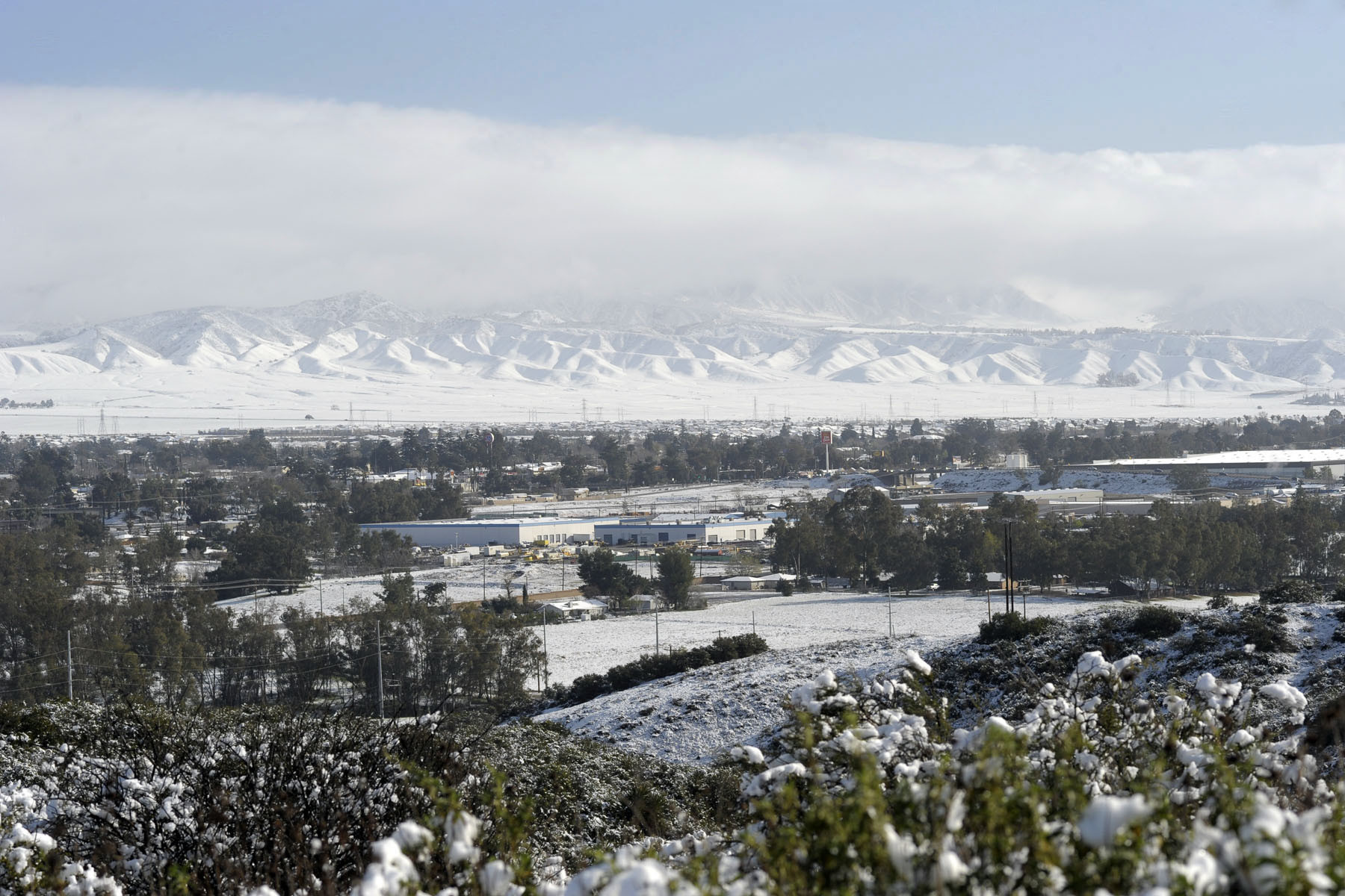 Beaumont with snowy mountains in the distance